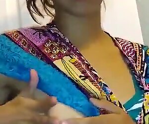 Indian NRI Girl teaching how to milk her boobs...