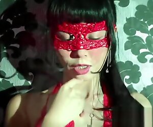 Japanese babe Marica masturbates in front of a mirror