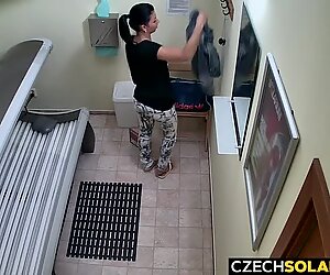 Beautiful Brunette Masturbating in Solarium